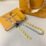 Louis Vuitton Monogram Tied Up Necklace Gold And Silver - Image 4
